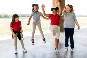 Girls Jumping for Joy Gulf South Elementary 0227 small 1600 x 1065